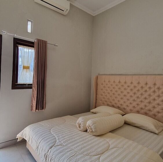 펜션 Oemah Wisata Ringinsari