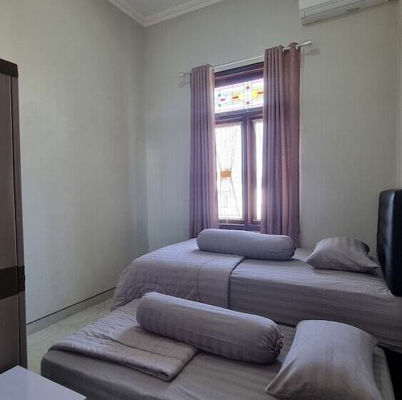 펜션 Oemah Wisata Ringinsari