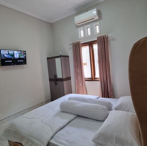 펜션 Oemah Wisata Ringinsari