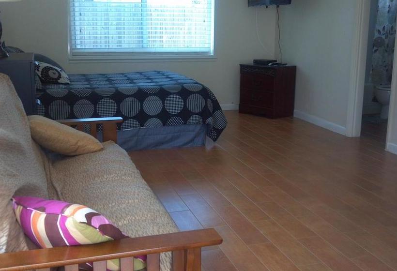 فندق Eamon James Apartments & Suites