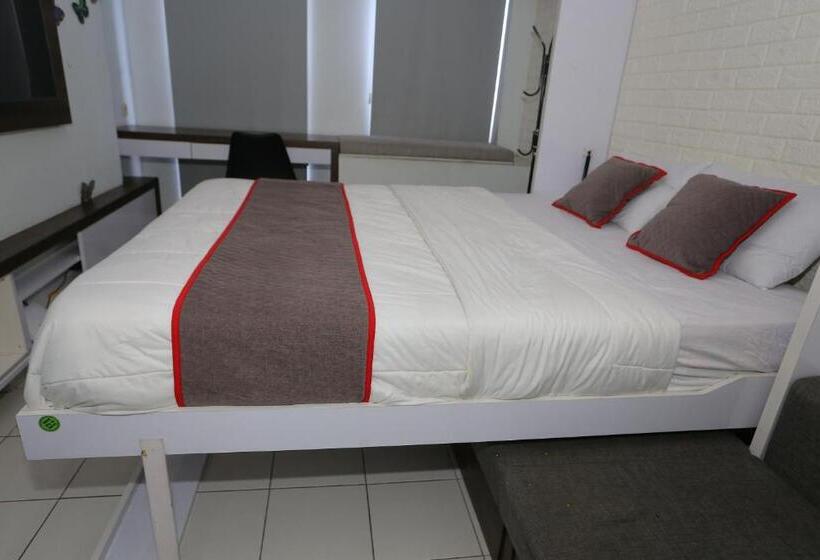 ホテル Capital O 93490 Yubi Room Patraland