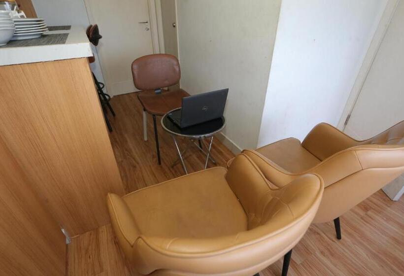 Отель Capital O 93490 Yubi Room Patraland