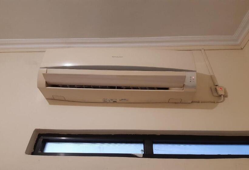 ホテル Oyo 93523 Penginapan Laras Paminggir