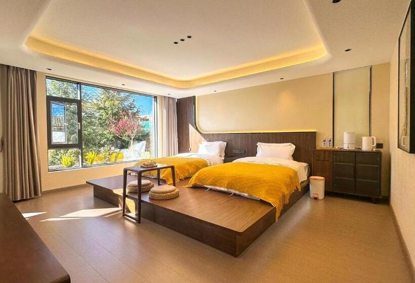 پانسیون Lijiang Painted Mountain Cloud House Boutique B&b