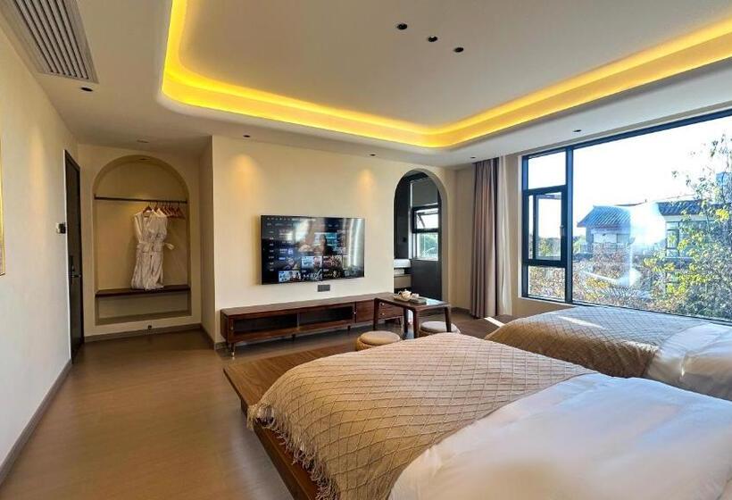 پانسیون Lijiang Painted Mountain Cloud House Boutique B&b