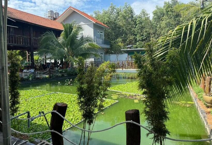 تختخواب و صبحانه Bưng Riềng Garden