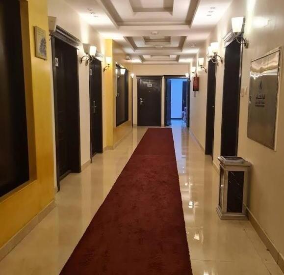 أجنحة ميثاق الفندقية