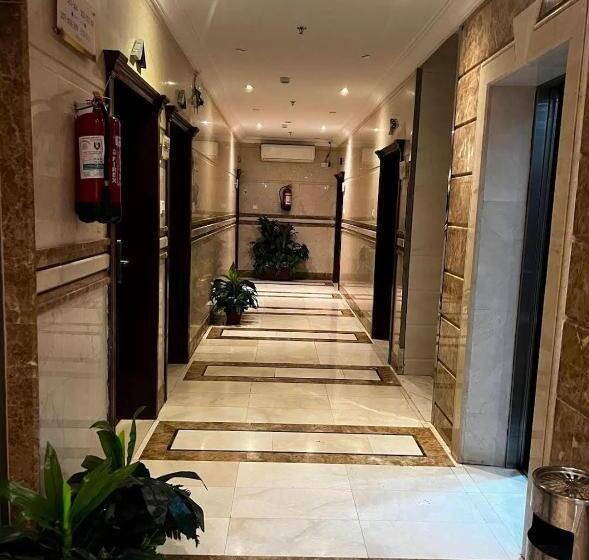 أجنحة ميثاق الفندقية