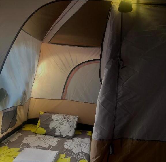 تختخواب و صبحانه Jenna S Beach House