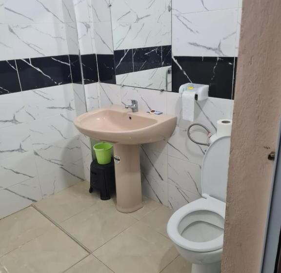 هتل Auberge Mandar Itto A Station De Service Ziz