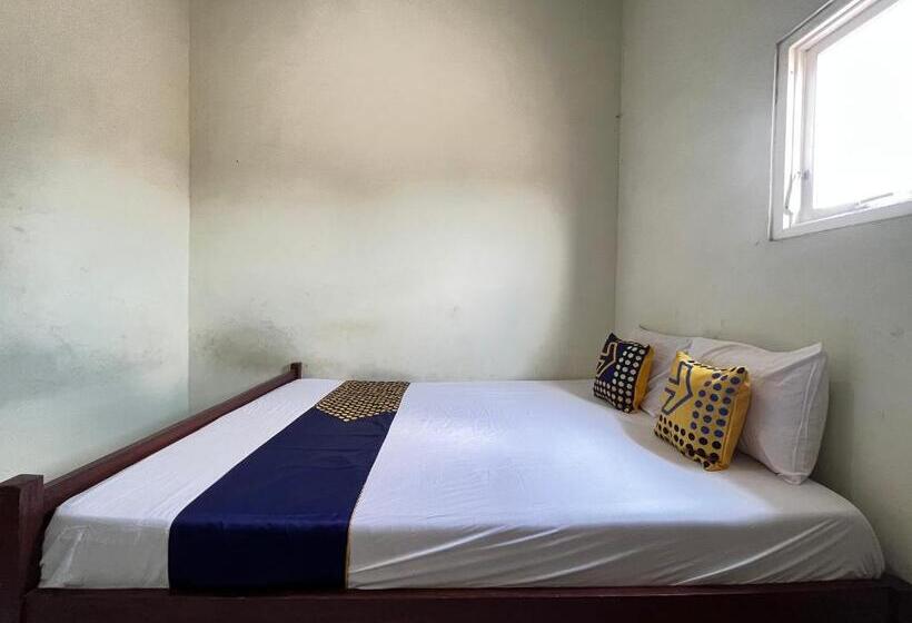 Отель Spot On 93423 Kost Berkah