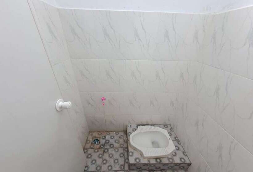 בית מלון כפרי Spot On 93464 Penginapan Tulimario Syariah