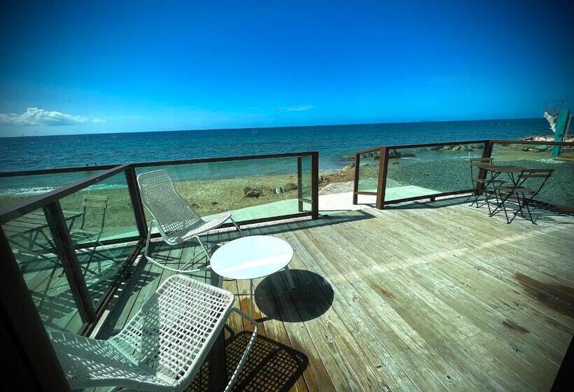 Pension (Hôtel basse catégorie) 1 Corcega Beachfront Suites