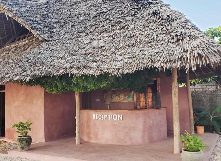 בית מלון כפרי Paradise City