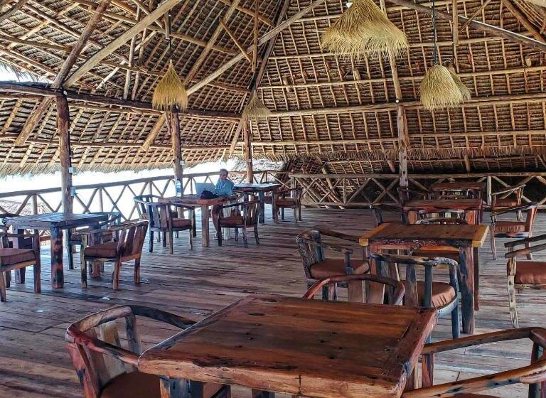 בית מלון כפרי Paradise City