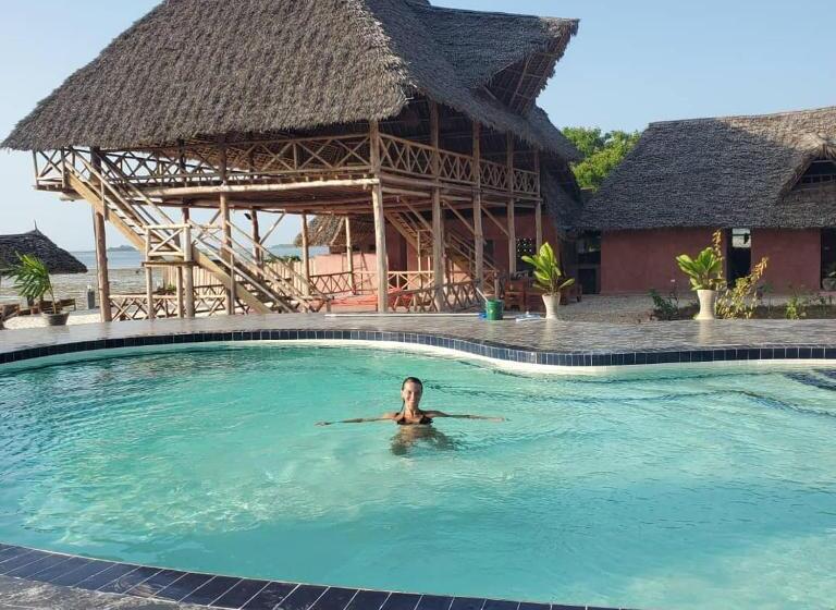 בית מלון כפרי Paradise City