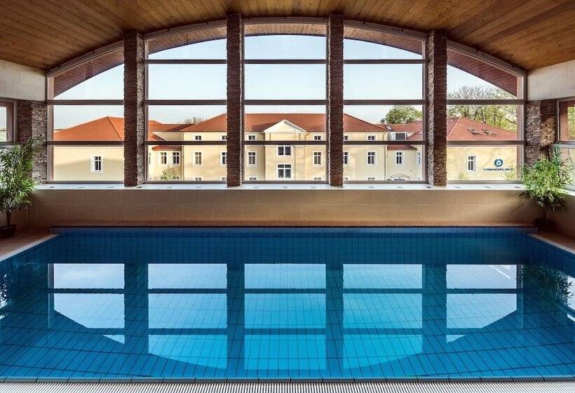 Отель Garzon Plaza