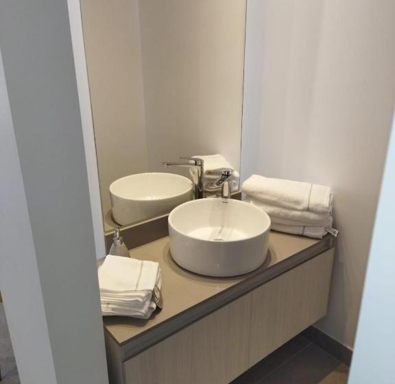 فندق Distrito 90