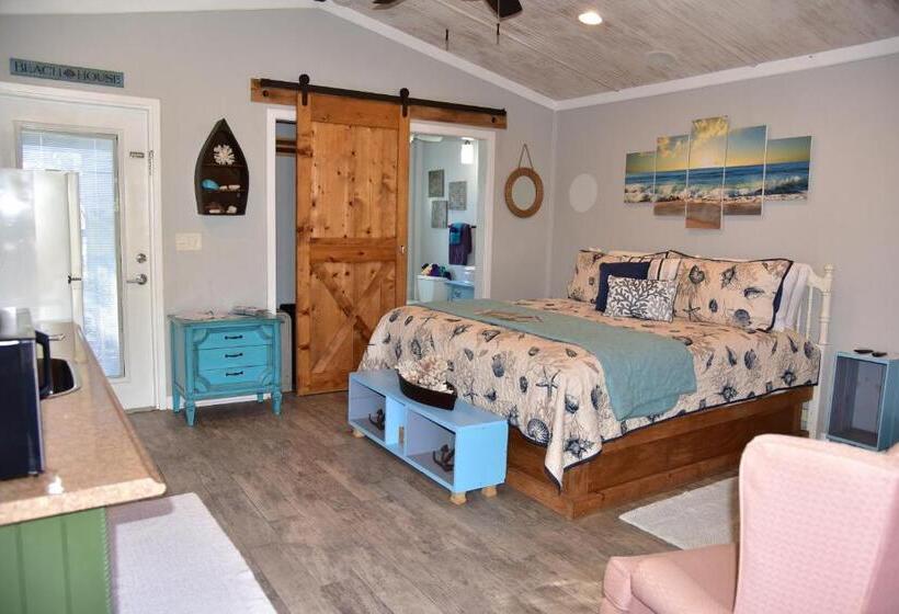 فندق The Beach House At Si Como No Inn