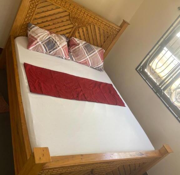 ユースホステル A Cozy Home Stay In Arusha Catus House