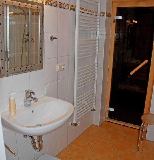 호텔 Ferienhaus Unterm Reetdach