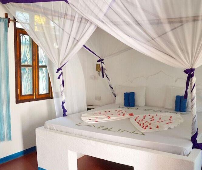 בית מלון כפרי Laguna Palace Michamvi Kae