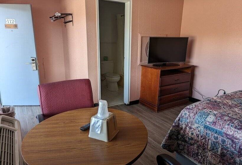 호텔 Travelers Inn