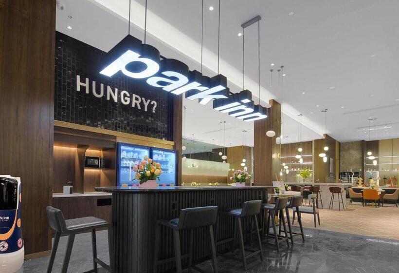 호텔 Park Inn By Radisson Nanchong Yilong Star City Plaza