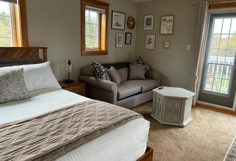 بنسيون Tides Inn Guest Suites