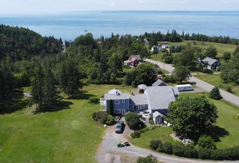 بنسيون Tides Inn Guest Suites