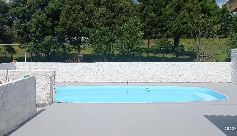 פנסיון Casa Inteira Com Piscina