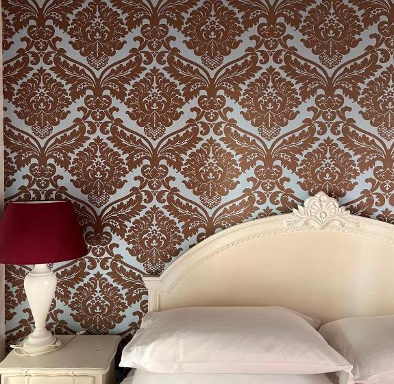 פנסיון Piazzetta De' Monti Suites