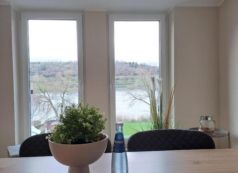 ホテル Ferienwohnungen Cafe Maarblick