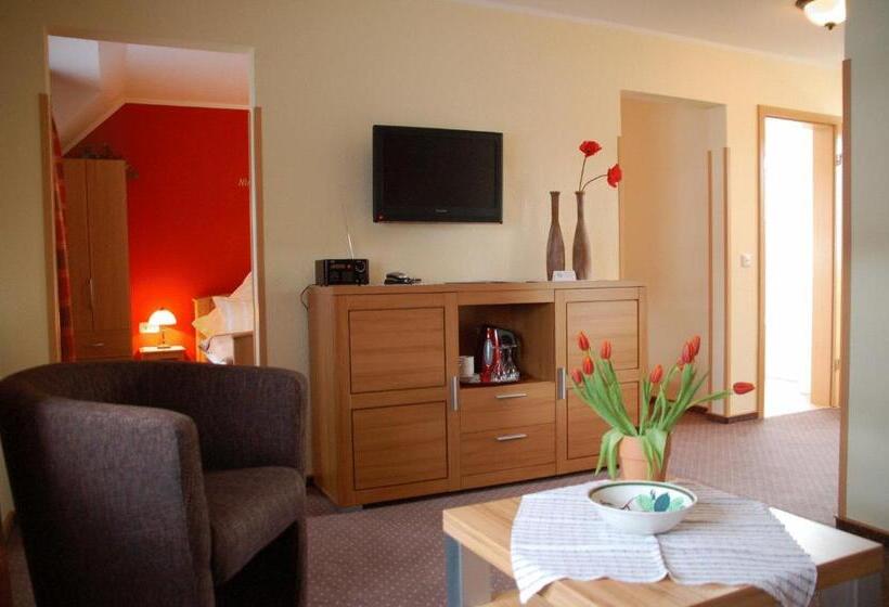 Отель Ferienwohnungen Cafe Maarblick