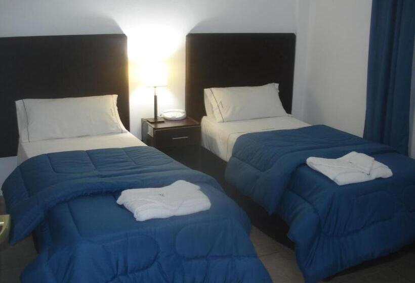 Отель Morada Suites