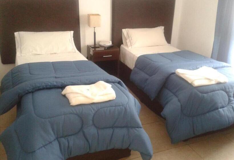 Отель Morada Suites