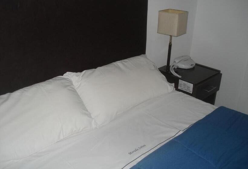 Отель Morada Suites