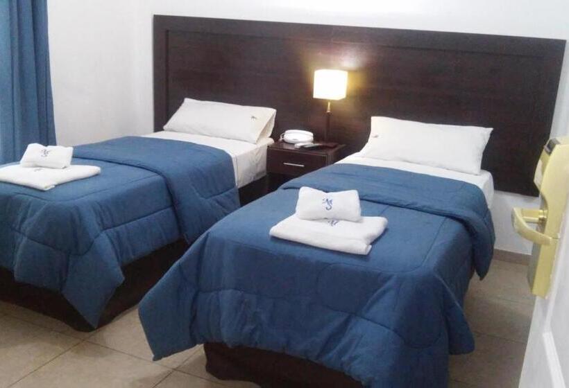 Отель Morada Suites