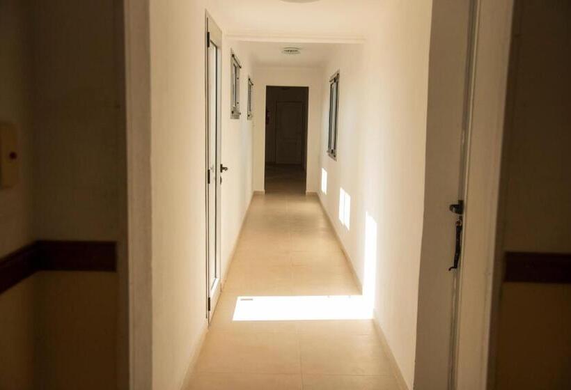 Отель Morada Suites