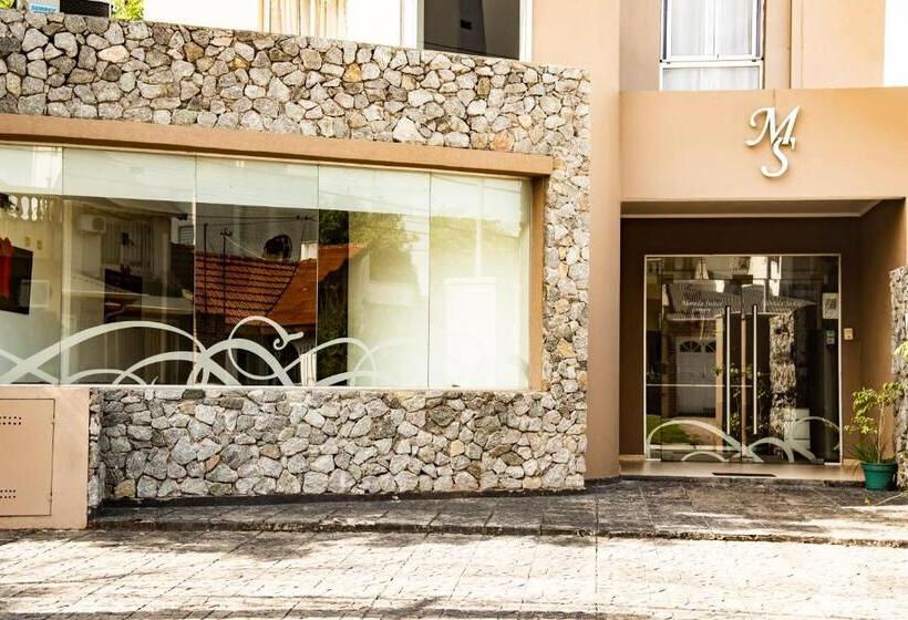 Отель Morada Suites