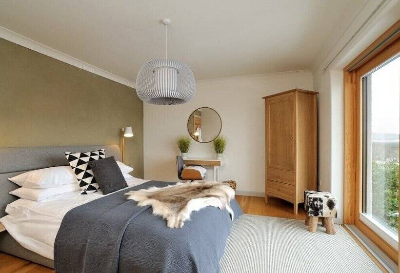 فندق Tom S Lodge