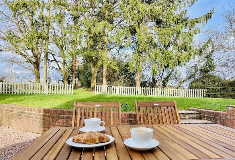 Log Burner And Beamed Ceilings King Size Bed