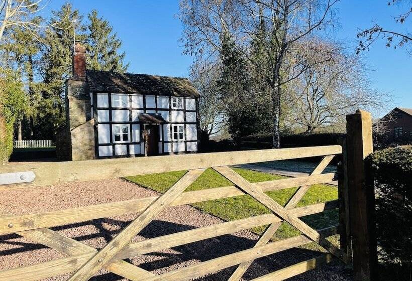 Log Burner And Beamed Ceilings King Size Bed