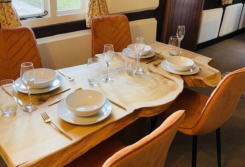 Log Burner And Beamed Ceilings King Size Bed