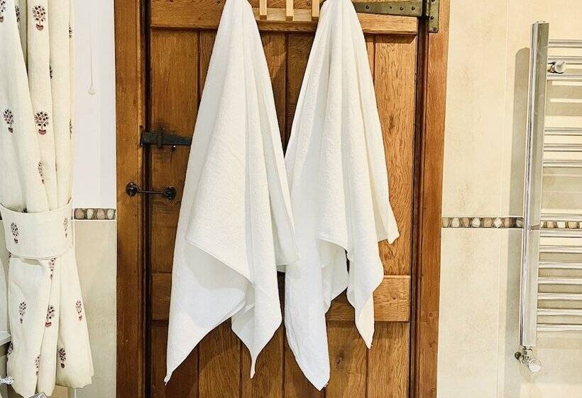 Log Burner And Beamed Ceilings King Size Bed