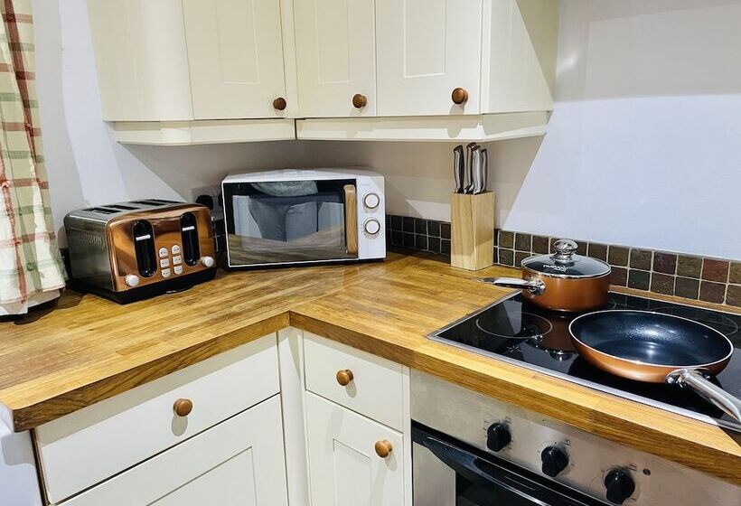 Log Burner And Beamed Ceilings King Size Bed