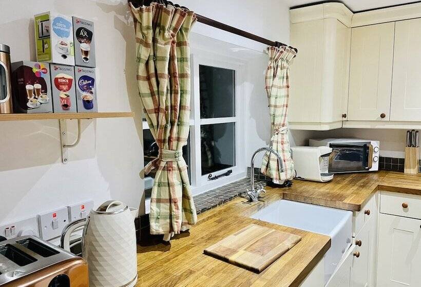 Log Burner And Beamed Ceilings King Size Bed