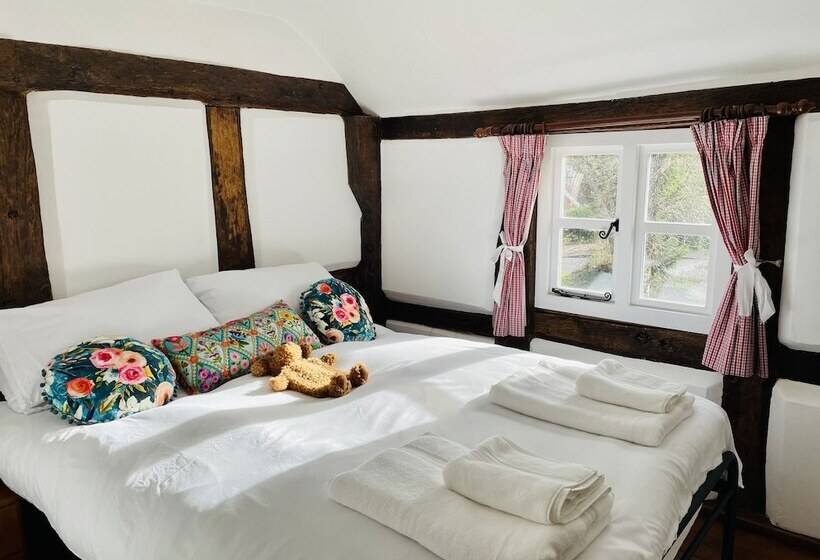 Log Burner And Beamed Ceilings King Size Bed