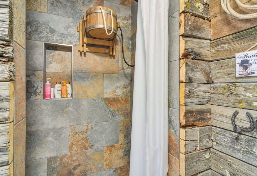 Riverfront Pine Cabin W/ Hot Tub & Mountain Views!