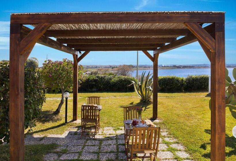 Отель Laguna Dei Fenici